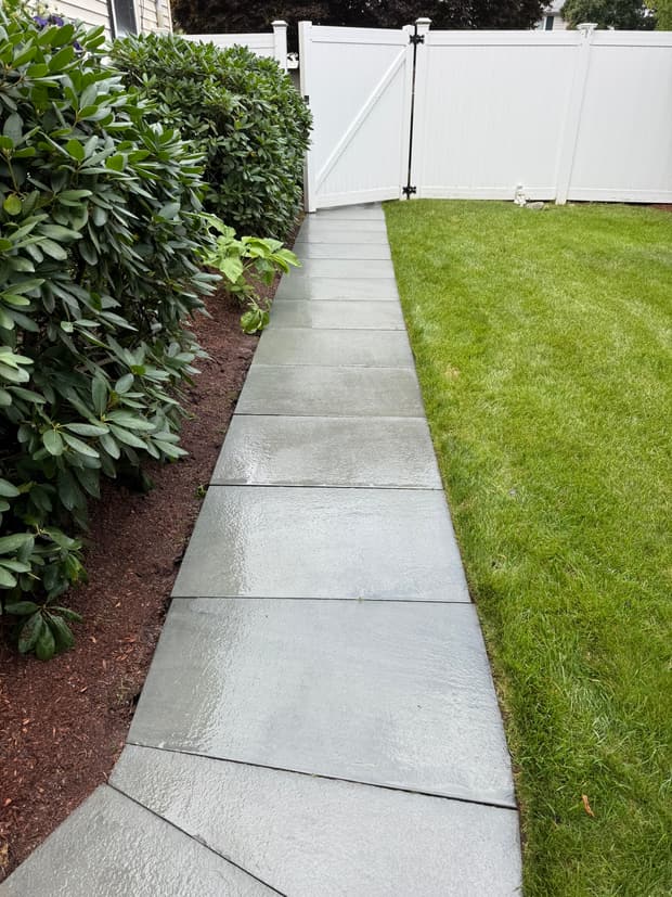 The same walkway after the wash, clean and even.